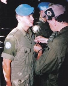 Private Erwin 'Juan' Schoenfeldt receiving his UNPROFOR medal